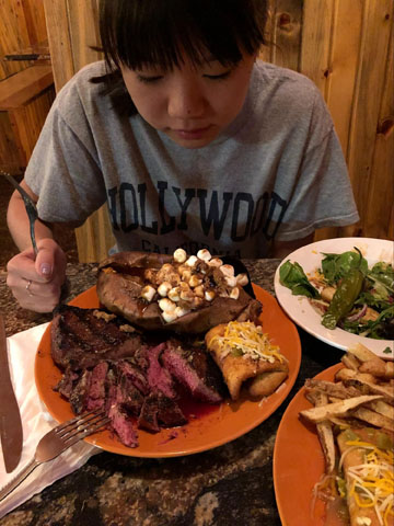 Aerin and huge steak dinner